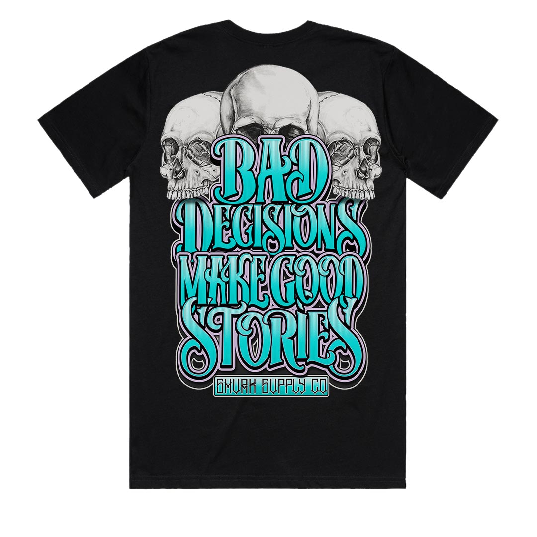 Back view of BAD DECISIONS Make Good Stories black t-shirt featuring triple skull artwork with turquoise typography, hand-illustrated punk design by SMVRK SUPPLY CO and Geltchy, Australian made heavy cotton graphic tee