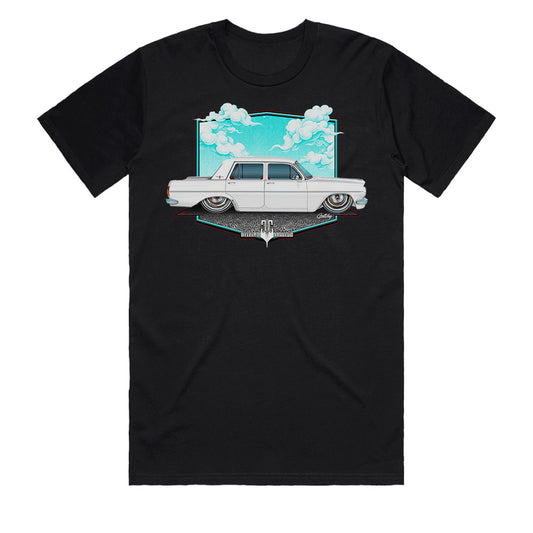 EH Holden T-Shirt black featuring hand-drawn artwork of a Holden Premier car with clouds in the background.
