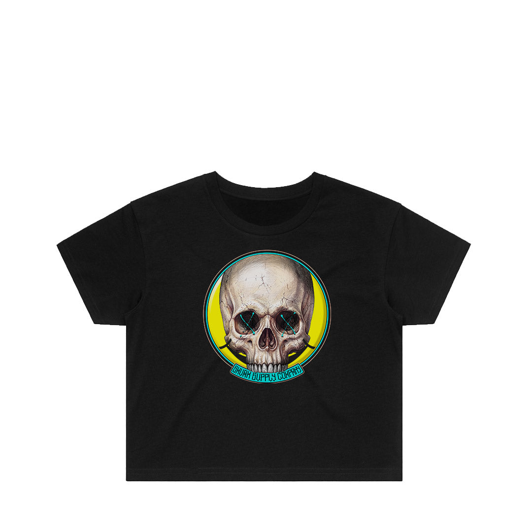 Graphic crop tee in black with a cracked HAPPY? smiley skull print by SMVRK Supply Co, womens cropped t-shirt, illustrated by Geltchy